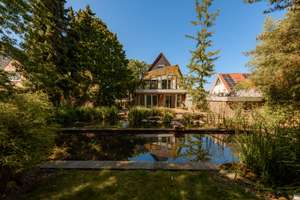 Bezugsfreies Zweifamilienhaus mit Schwimmteich, Wintergarten und parkähnlichem Grundstück – 33729 Heepen, Bielefeld – Vorschaubild 33