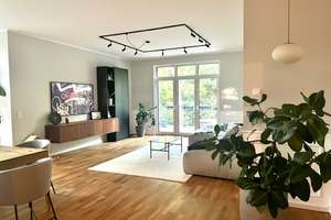 Lichtdurchflutete und energieeffiziente Wohnung mit großem Balkon