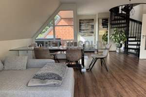 Wunderschöne 4-Zimmer-Dachgeschosswohnung mit Loggia, zwei Balkonen und Tiefgaragenstellplatz