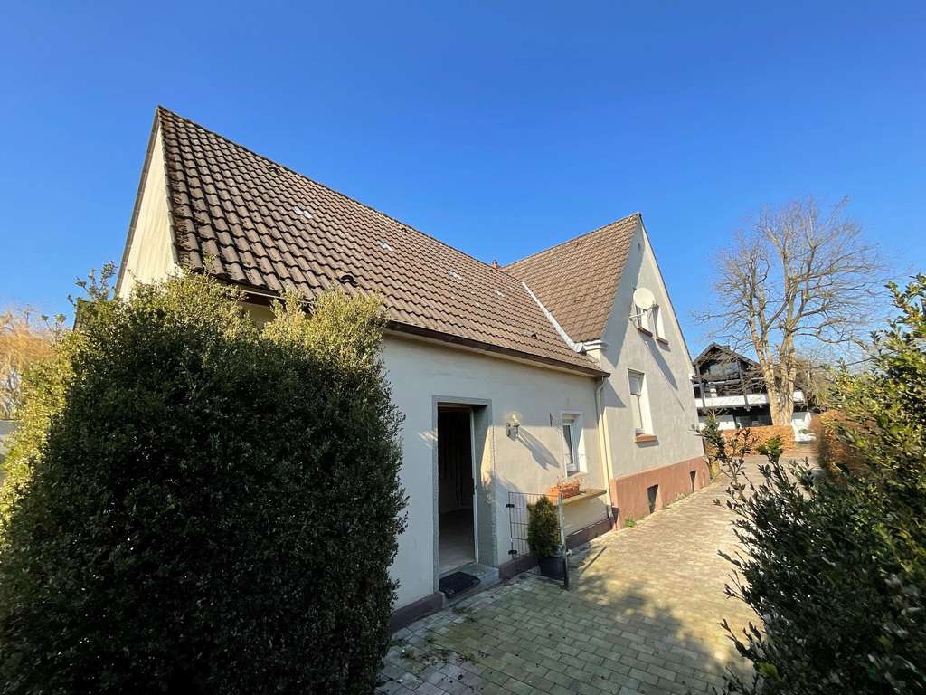 Immobilie in Lengerich - Renovierungsbedürftige Doppelhaushälfte mit Potenzial und weiterem Baugrundstück - Bild 1