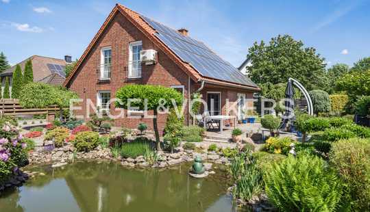 Bild von WO WOHNQUALITÄT AUF MÖGLICHKEITEN TRIFFT - EFH MIT GARTEN, KAMIN UND VERMIETETER GEWERBEEINHEIT