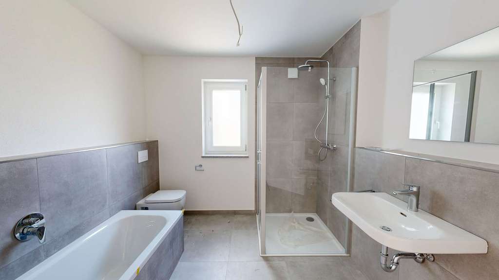 Immobilie in Büchlberg - Neuwertige 3-Zimmer-Wohnung mit Balkon und Carport im Herzen von Büchlberg - Bild 3