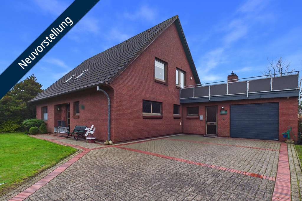 Immobilie in Esens - Familienfreundliches Wohnen in begehrter Lage in Esens -  Einfamilienhaus mit großem Grundstück - Bild 0