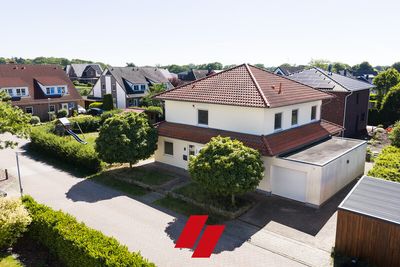 Schwanewede: Ansprechendes, großzügiges Einfamilienhaus mit Garage auf schönem Süd-West-Grundstück