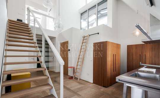 Design-Ikone am Charlottenplatz - Stylische Dach-Galerie-Maisonette mit Direktlift!