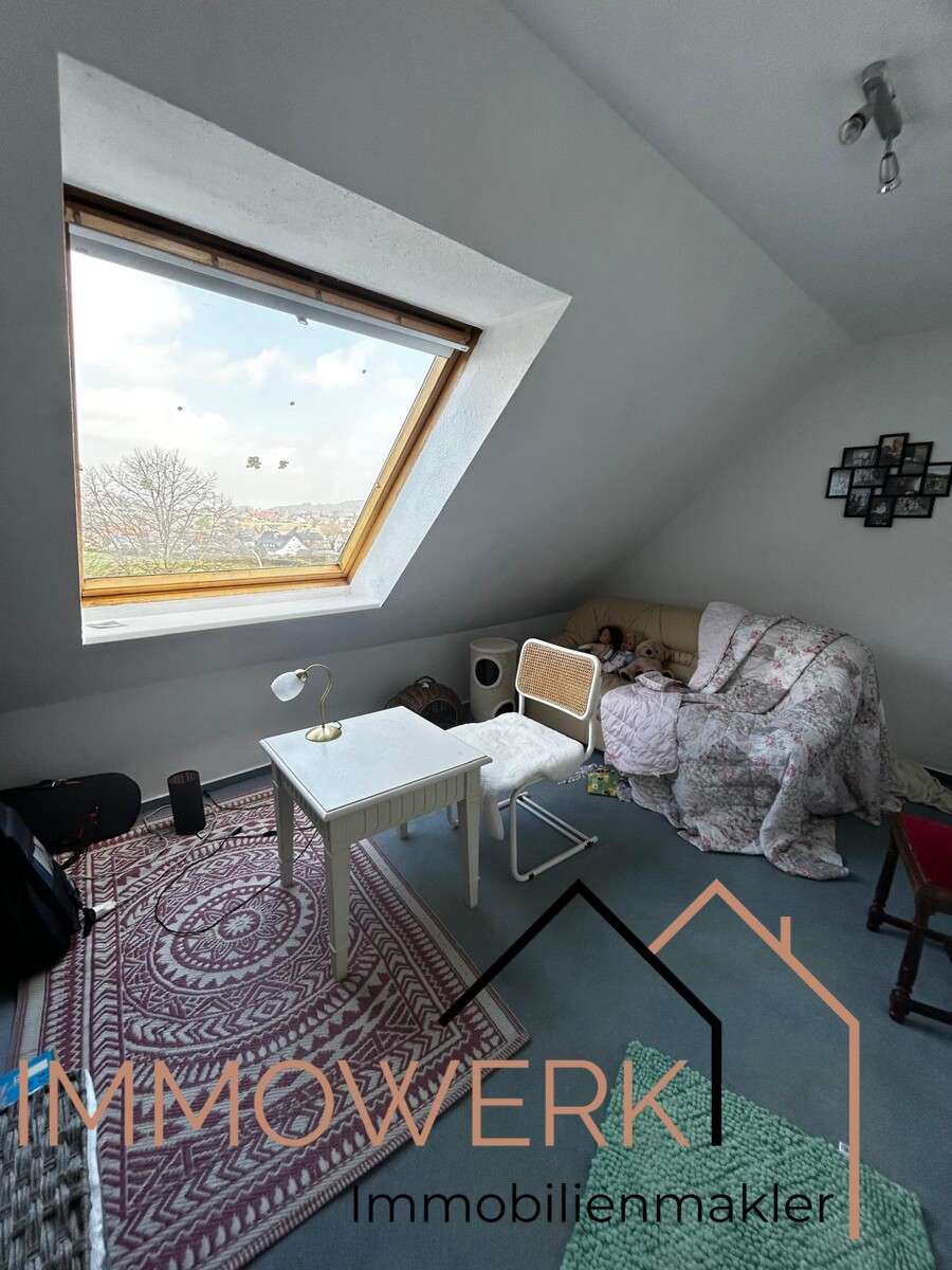 Immobilie in Luhden - Schön geschnittene, voll vermietete DG-Wohnung mit Balkon und Stellplatz. - Bild 4