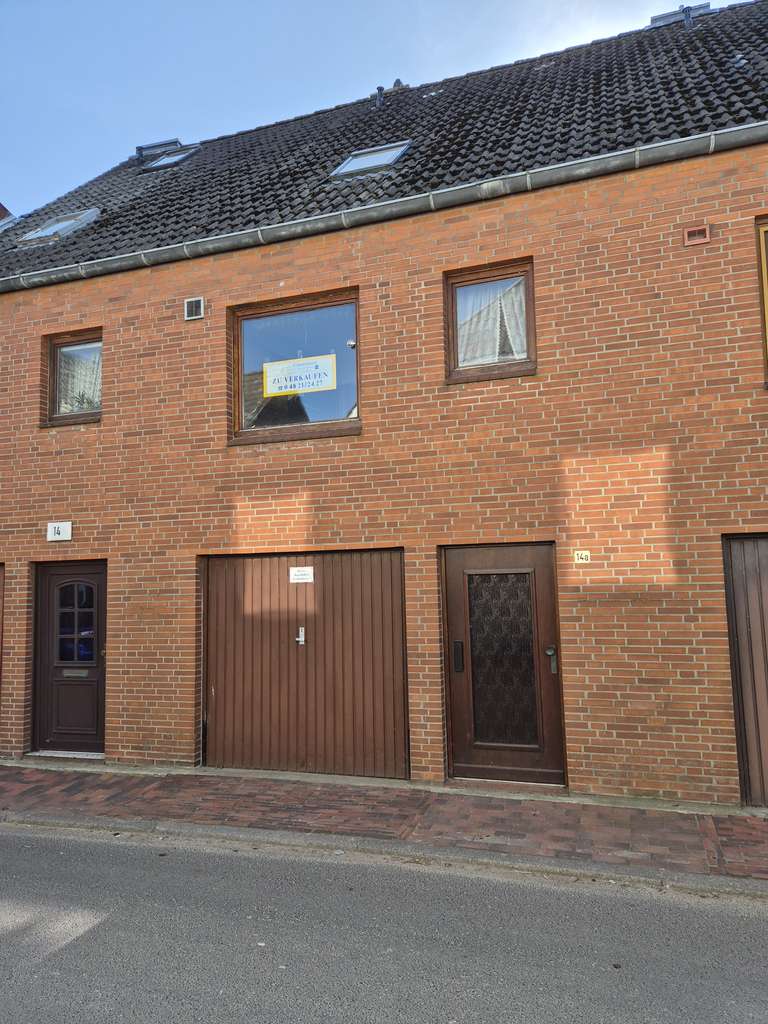 Immobilie in Nortorf - Gatermann Immobilien: Reihenmittelhaus mit Garage in Wilster an der Wilster Au - Bild 0