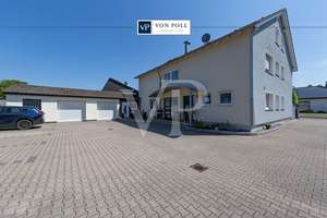 Wohnen und Gewerbe vereint – gepflegtes Mehrfamilienhaus mit 5 Einheiten und großer Halle