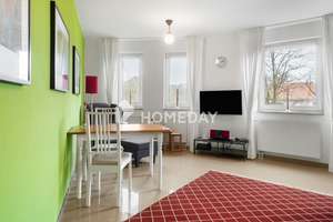 Lichtdurchflutete 2-Zimmer-Wohnung mit charaktervollem Wohnbereich und Loggia