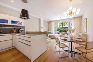 Moderne 2-Zimmer-Gartenwohnung mit Wintergarten und Deckenhöhen von 2,80m