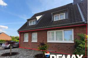 Gartenidylle in Krefeld-Hüls – Modernisierte Erdgeschosswohnung mit Wintergarten zu verkaufen!