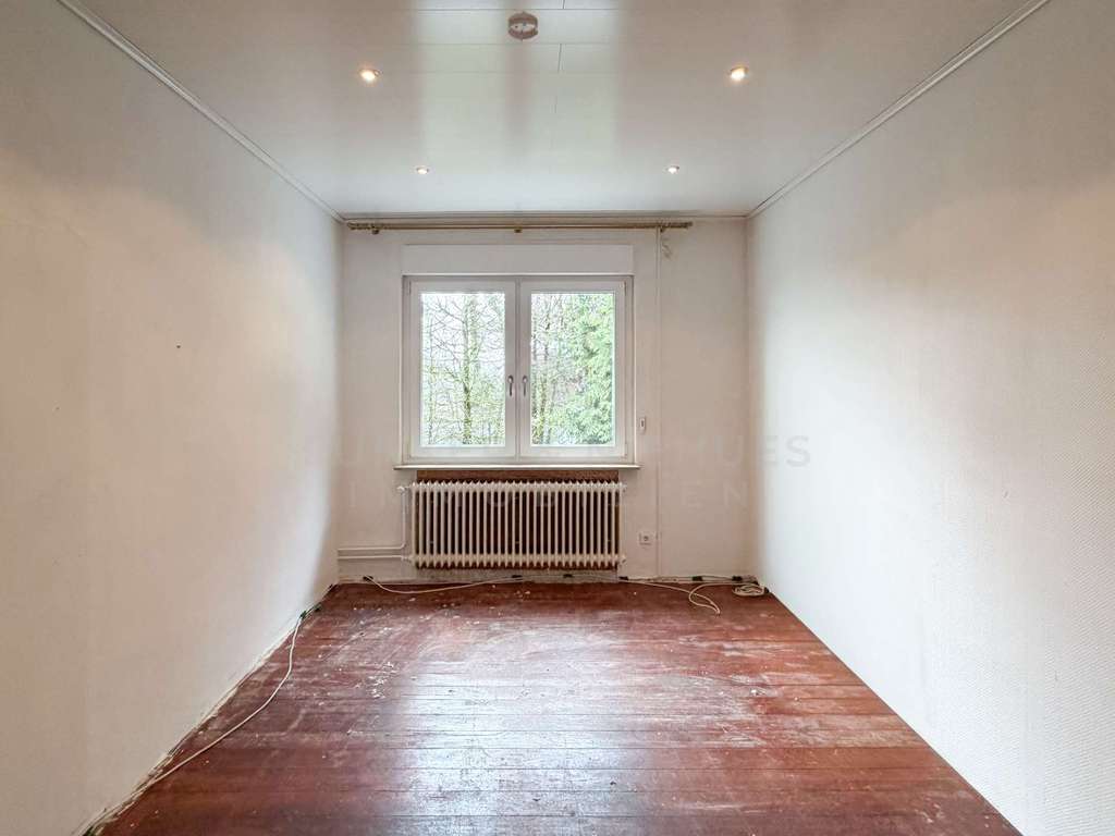 Immobilie in Steinhagen - Großes Grundstück in Steinhagen: Einfamilienhaus mit viel Potenzial für Ihre Wohnträume - Bild 2