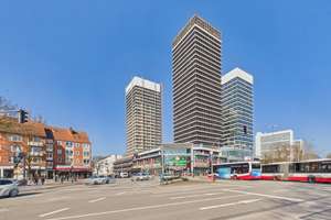 Urbanes Wohnen mit Panoramablick: Gepflegtes Südwest-Apartment im sanierten Denkmal-Tower