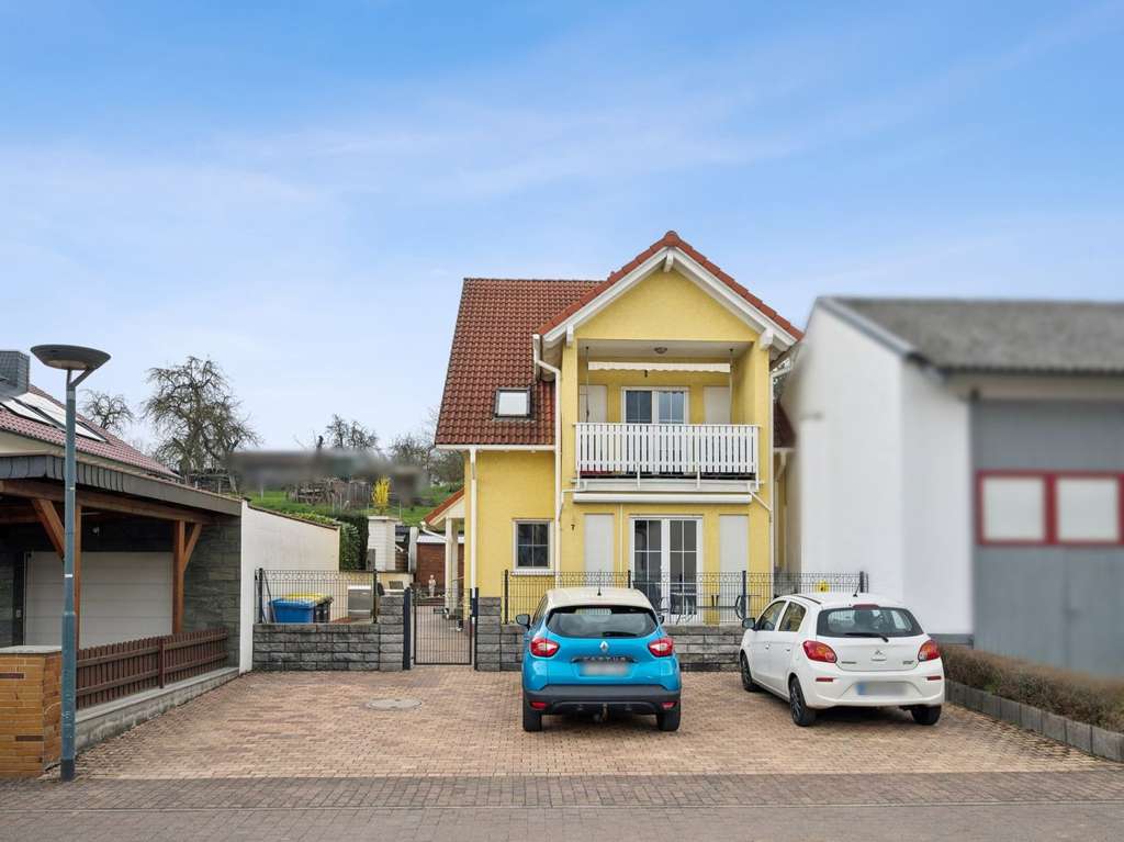 Immobilie in Florstadt - Gepflegtes, teilvermietetes Zweifamilienhaus in ruhiger Lage von Florstadt-Stammheim - Bild 2