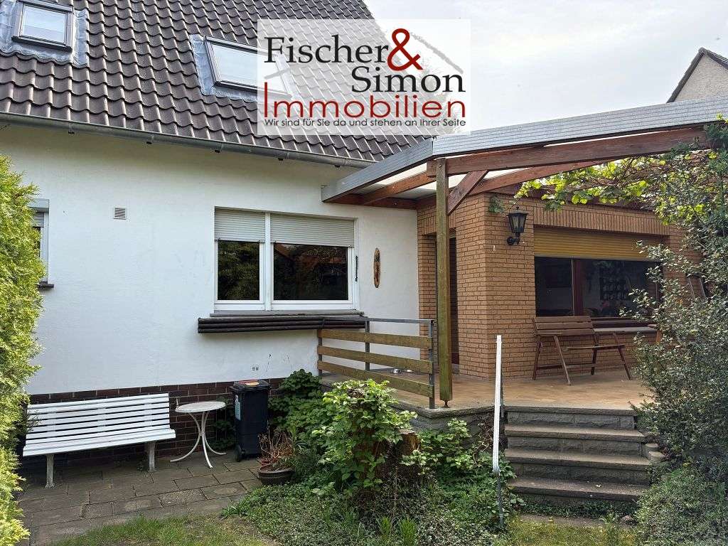 Immobilie in Rehburg-Loccum - Rehburg-Loccum: ansprechendes Einfamilienhaus m. Einliegerwohnung, Keller, Garage u. schönem Garten - Bild 2