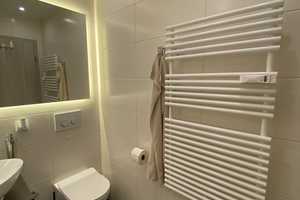 Top renoviert & familienfreundlich: 4-Zimmer-Wohnung mit Balkon, Aufzug & Einbauküche in Wolfsburg – Wolfsburg – Vorschaubild 12