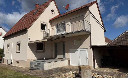 Stilvolles Einfamilienhaus mit Garten, Balkon und vielseitigen Wohnmöglichkeiten in Herxheim