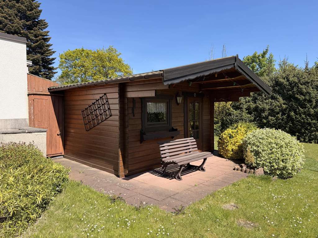 Immobilie in Hiddenhausen - Hiddenhausen - Gemütliches EFH mit üppigem Garten - Bild 4