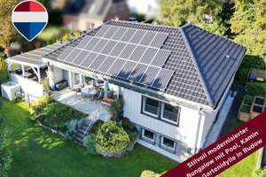 ca. 200 m² Wohn-/Nutzfläche - moderner, voll unterkellerter Bungalow mit Pool und Kamin