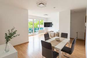Möblierte 3-Zimmer-Wohnung mit zwei Balkonen, Tiefgaragenstellplatz und Keller