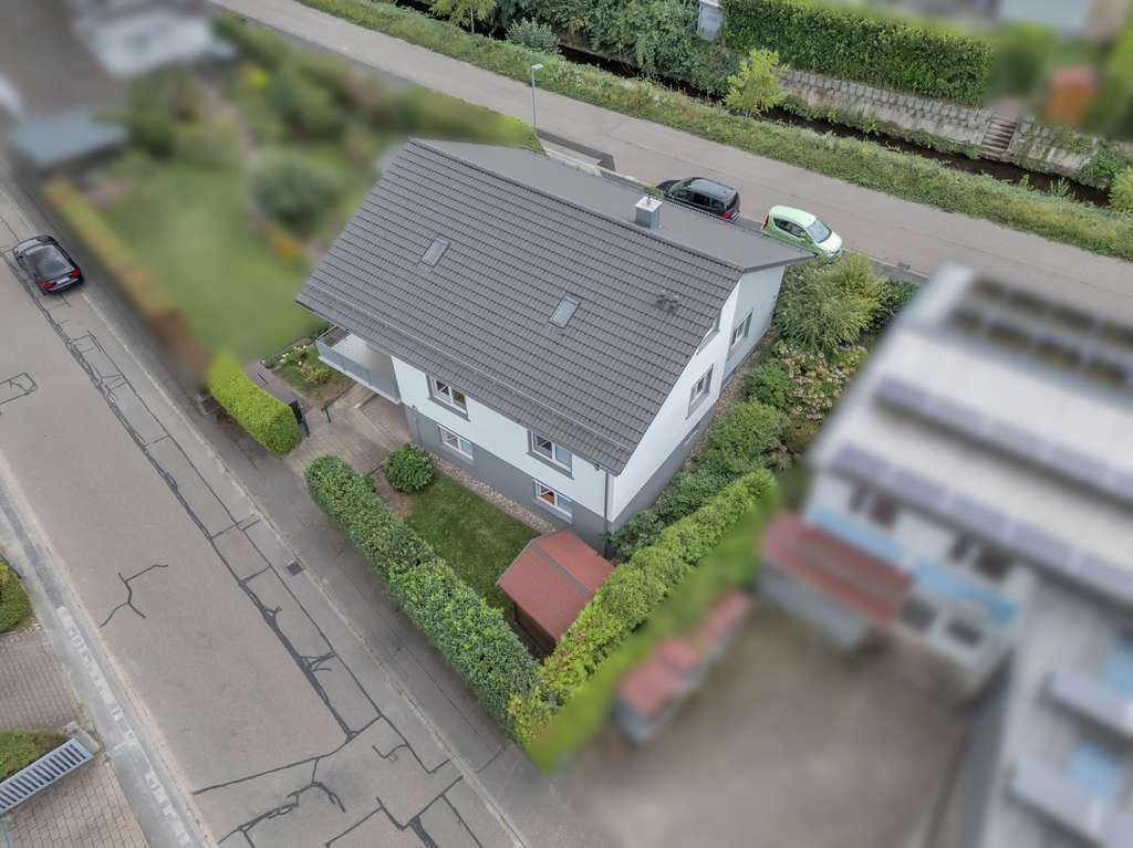 Immobilie in Kuppenheim - Wohntraum für die Familie - Freistehendes Einfamilienhaus mit kleiner Büroeinheit / ELW - Bild 1