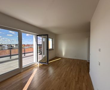 Moderne 2-Zimmer Wohnung mit Einbauküche und großer Terrasse über den Dächern von LE