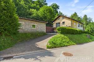 Zweifamilienhaus| ca. 215 m² Wohnfläche | ca. 3.500 m² Grundstück | Anbau von 2002 | 2 Garagen – Die vollständige Adresse der Immobilie erhältst du vom Anbieter., 55779 Heimbach – Vorschaubild 1