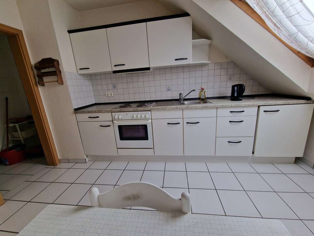 Immobilie in Lembruch - Charmante, gut vermietete zwei-Zimmer-Dachgeschosswohnung zu verkaufen - Bild 4