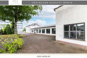 Zweifamilienhaus mit ausgebautem DG, Werkshalle, Garagen und attraktiver Bauoption in Neu-Isenburg