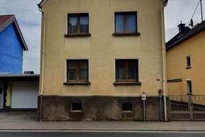 Solide Kapitalanlage mit Ausbaupotenzial – vermietetes Einfamilienhaus mit großer Scheun, Grundstück – Hauptstraße 44, 65558 Flacht – Vorschaubild 1