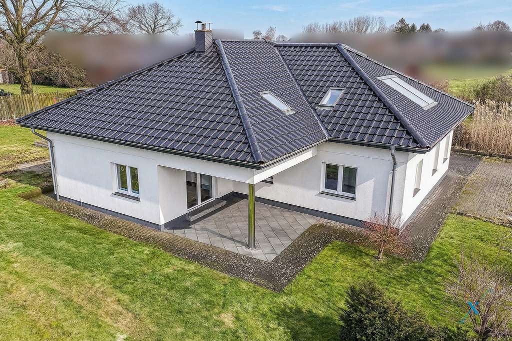 Immobilie in Mittelangeln - Ebenerdig wohnen mit Ausbaupotential und großem Garten in Rüde - Bild 1