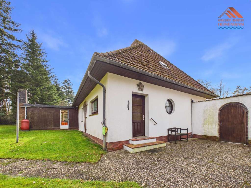 Immobilie in Neuenkirchen - Nostalgie trifft Potenzial: Freistehendes Einfamilienhaus auf großem Naturgrundstück in Neuenkirchen - Bild 3