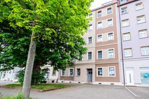 Singlewohnung in zentraler Lage, mit Terrasse, Parkett, Fußbodenheizung und Dusche.