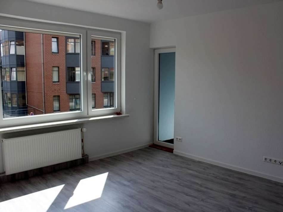 Wohnzimmer mit Balkonausgang