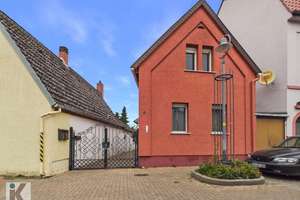 Charmantes Einfamilienhaus mit großzügiger Wohnküche und Terrasse