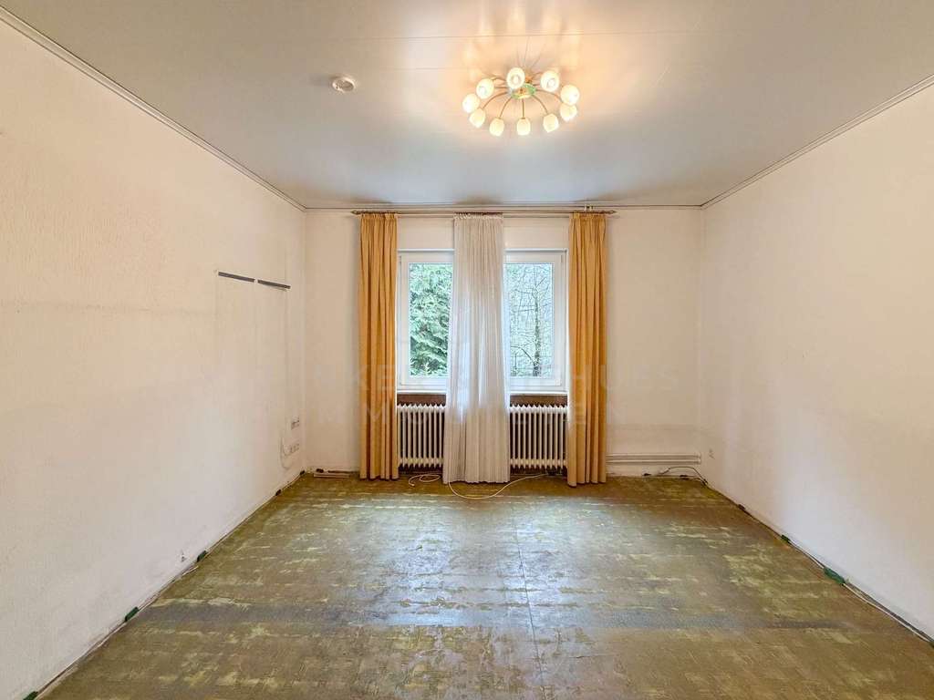 Immobilie in Steinhagen - Großes Grundstück in Steinhagen: Einfamilienhaus mit viel Potenzial für Ihre Wohnträume - Bild 3