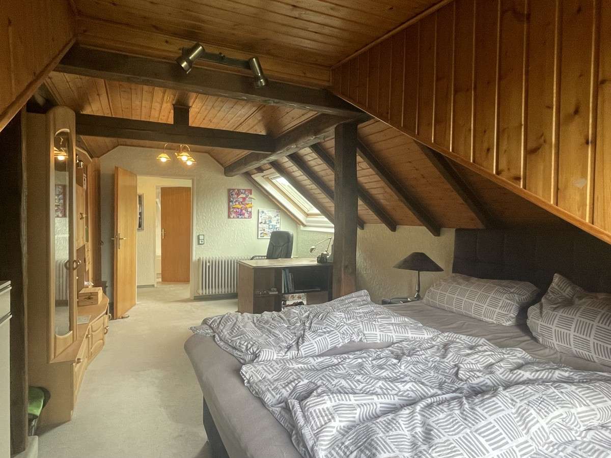 Immobilie in Florstadt - Einfamilienhaus im Bungalowstil mit großem Garten und Terrasse - Bild 24