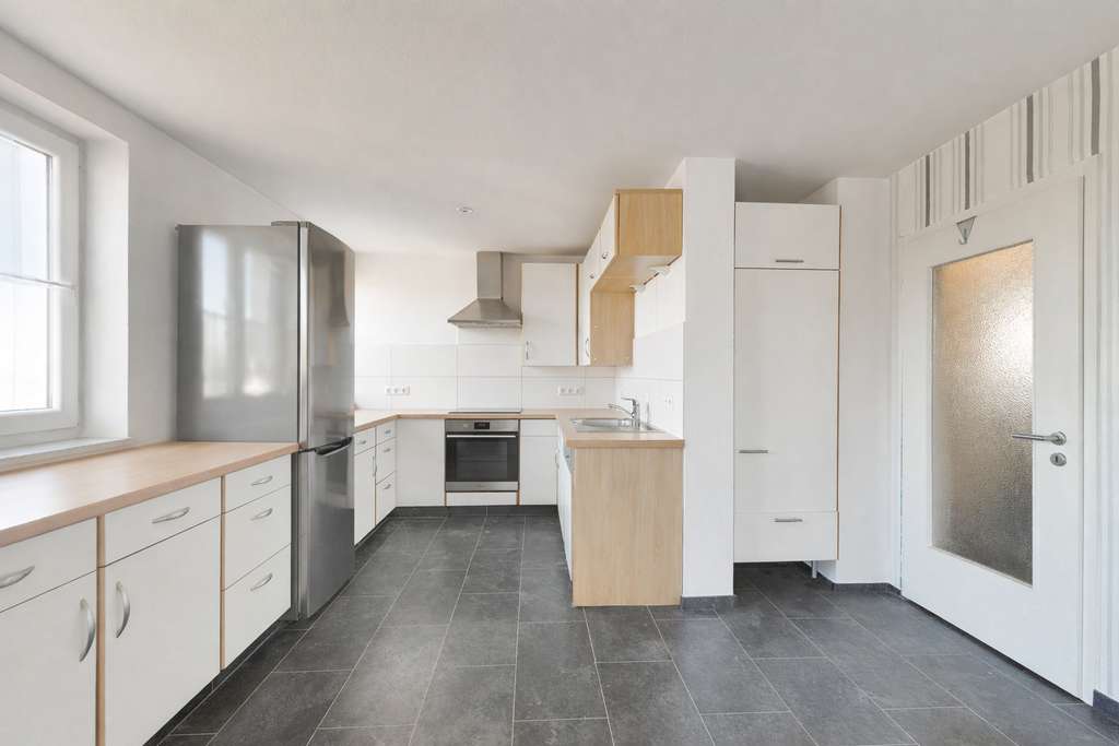 Immobilie in Petersberg - Vielseitige Doppelhaushälfte mit zwei Wohneinheiten, großem Grundstück in Petersberg OT Steinau - Bild 2