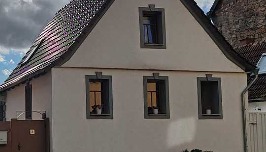 Bild von ImmobilienPunkt*** Schnuckeliges Haus mit großer Garage und schönem Hof