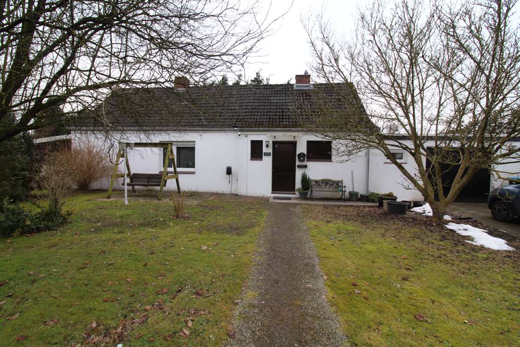 Immobilie in Westoverledingen - Kleines, gemütliches Wohnhaus in Flachsmeer mit schönem Grundstück in zweiter Reihe! - Bild 0