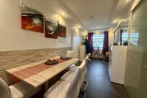Moderne 3-Zimmer-Gartenwohnung mit überdachter Terrasse und Tiefgaragenstellplatz – Wolfsburg – Vorschaubild 1