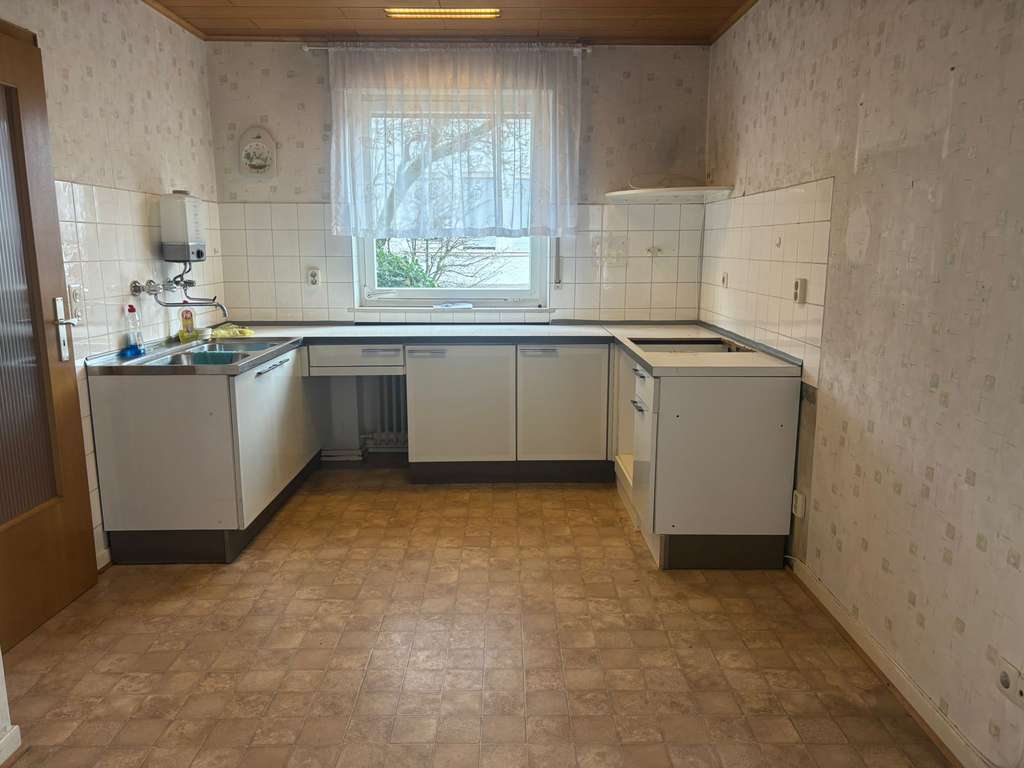 Immobilie in Gütersloh - Charmante Doppelhaushälfte zum Renovieren – ideale Gelegenheit! - Bild 4