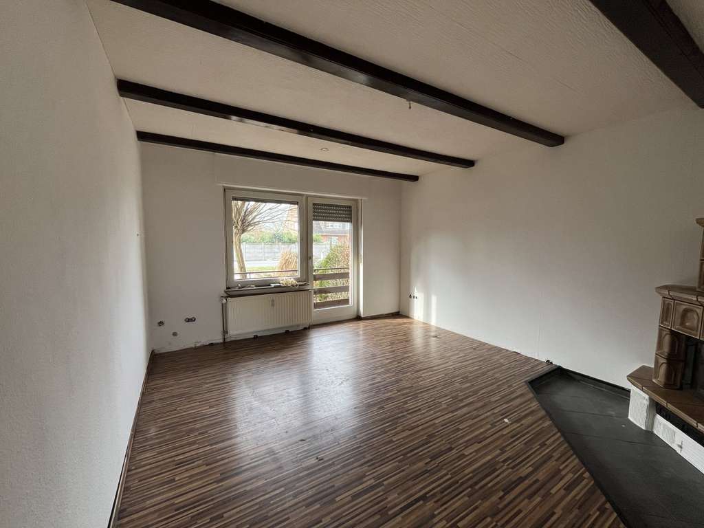 Immobilie in Xanten - Einladendes Einfamilienhaus mit Einliegerwohnung, Keller, Garage und Garten - Bild 2