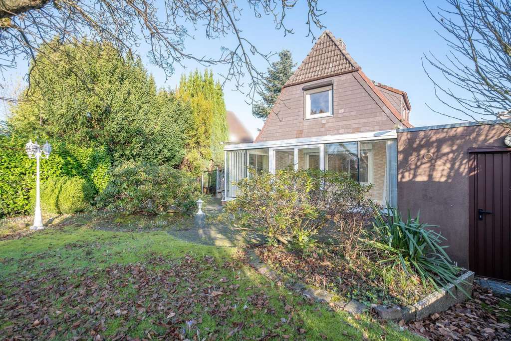 Immobilie in Kronshagen - Charmantes Siedlungshaus auf malerischem Grundstück - Bild 2