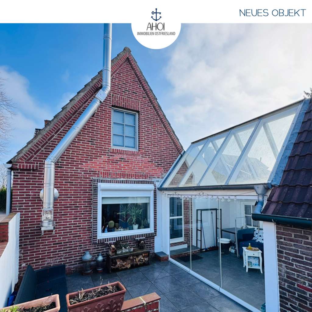 Immobilie in Hinte - Liebevoll modernisiertes Kleinod mit Wintergarten, Nebengebäude und Garagen - Bild 0