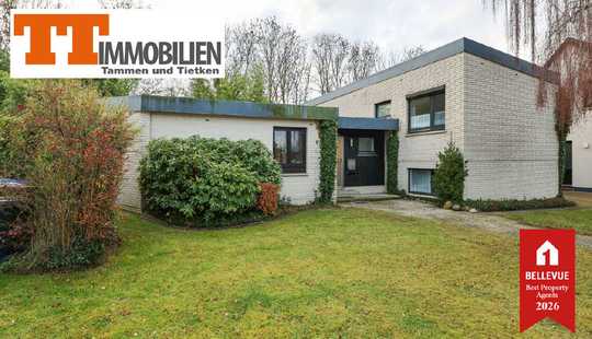 Bild von TT bietet an: Split-Level-Architektur auf großzügigem Grundstück  Geräumiges 6-Zimmer-Haus in