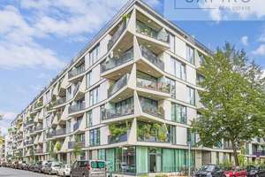 MODERNE NEUBAU-WOHNUNG MIT TERRASSE UND 
BALKON UNWEIT DES MAYBACHUFERS