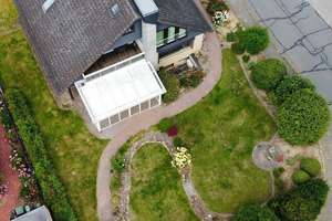 Exklusives Einfamilienhaus mit Panorama-Wintergarten, Sauna, Pelletheizung & Traumgarten in Melbeck – Sonnenring 4, 21406 Melbeck – Vorschaubild 2