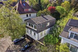 Flexibel nutzbares Wohn- und Geschäftshaus mit großem Garten 
und umfangreichen Parkmöglichkeiten
