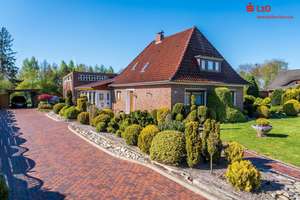 Modernisierter Bungalow mit Wintergarten und großem Garten in Augustfehn II – Die vollständige Adresse der Immobilie erhältst du vom Anbieter., 26689 Apen – Vorschaubild 1